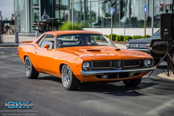 front view of a orange 1972 plymouth barracuda 340