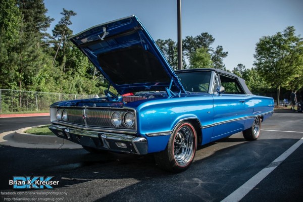 blue 1966 dodge coronet convertible with its hood up