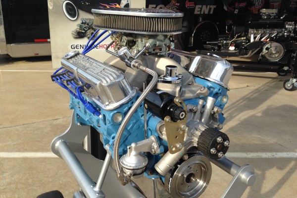 mopar v8 engine on a display stand