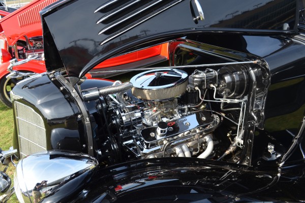 chromed out v8 sbc engine in an old hot rod