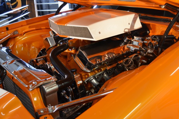 a big block v8 engine in a customized muscle car