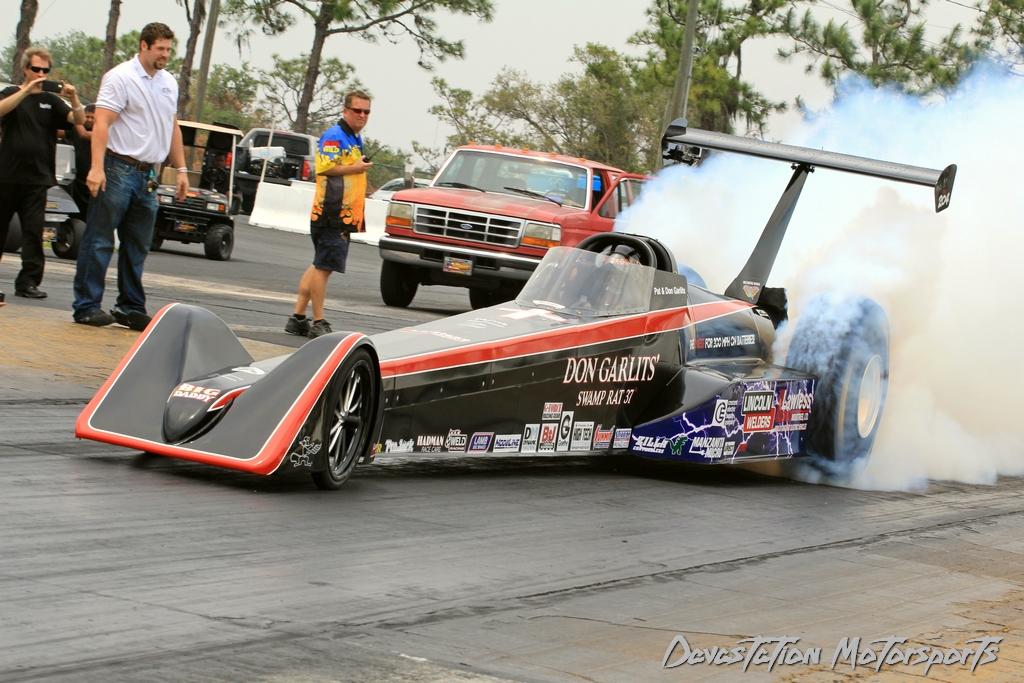 Don Garlits does a burnout in an electric dragster Swamp Rat 37