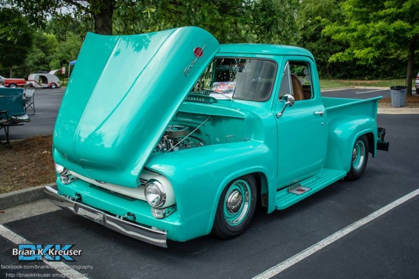 customized aqua blue ford pickup truck
