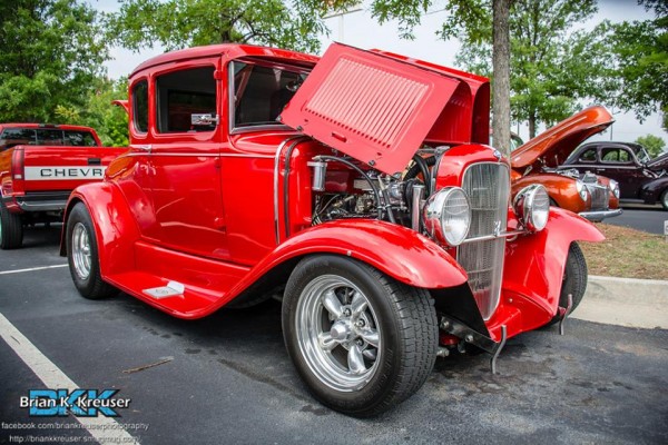 red ford five window fenderd hot rod coupe