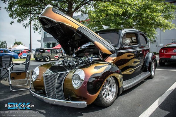 flamed hot rod coupe with modern v8 and custom wheels