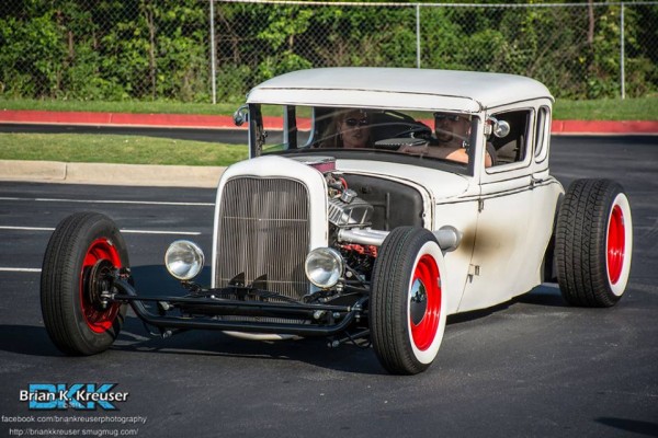lowered white ford five window hot rod coupe