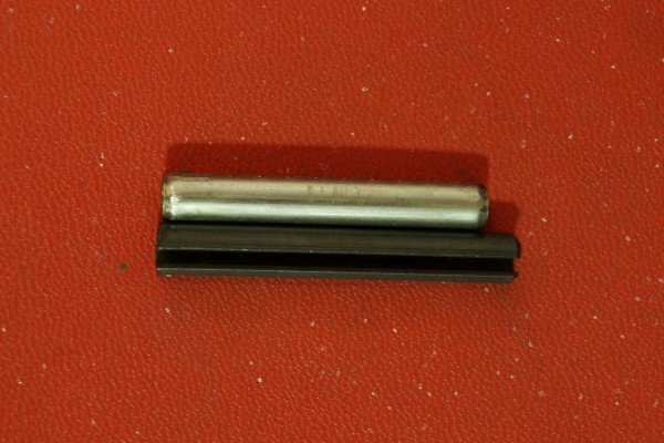 side by side comparison of subaru and aftermarket axle roll pins