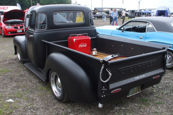 rear view of a vintage 5 window chevy 3100 pickup truck bed