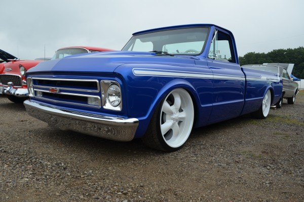 lowered customized blue chevy c10 pickup truck