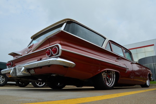 rear quarter view of a hot rod 1960 chevy parkwood station wagon