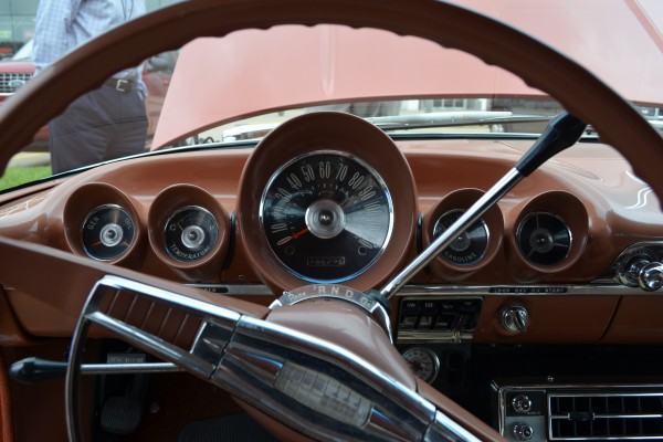 dash gauge cluster and steering wheel inside a 1960 chevy parkwood