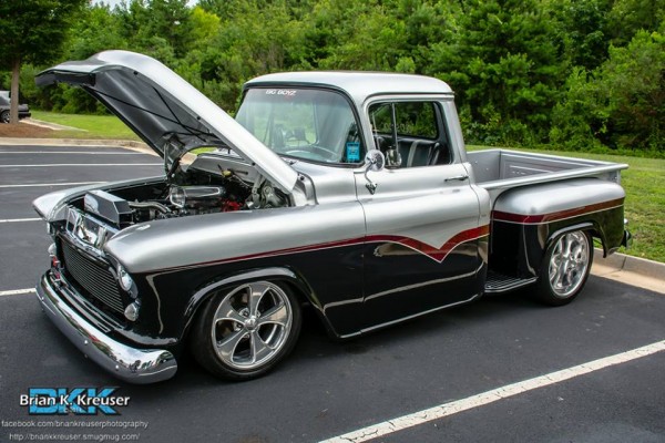 vintage chevy truck with custom wheels and paint