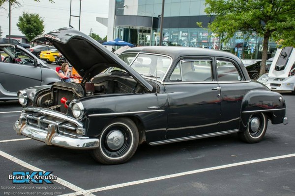 vintage chevy postwar coupe at a car show