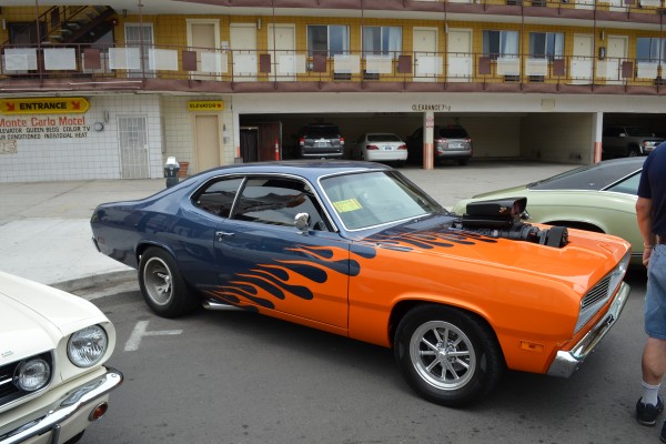 custom mopar hot rod with supercharged v8 and flame paint job