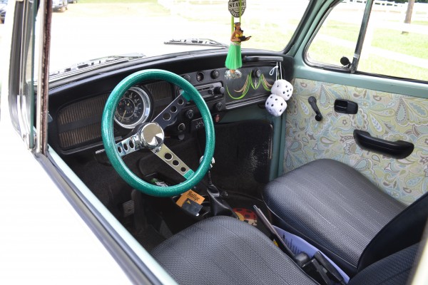 customized interior of a vintage Volkswagen beetle
