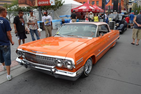 orange 1963 chevy impala custom lowrider at 2014 Hot August Nights in Reno, NV