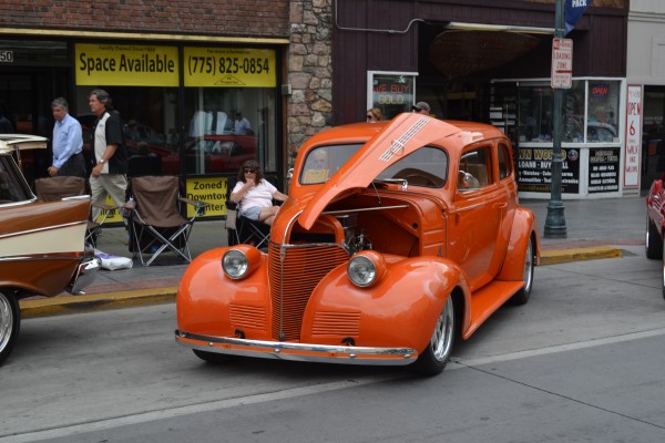 orange prewar hot rod coupe on street at 2014 Hot August Nights in Reno, NV