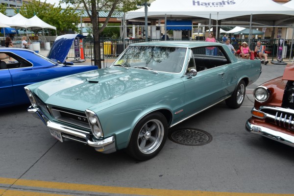 early first gen pontiac gto with custom wheels at hot august nights 2014