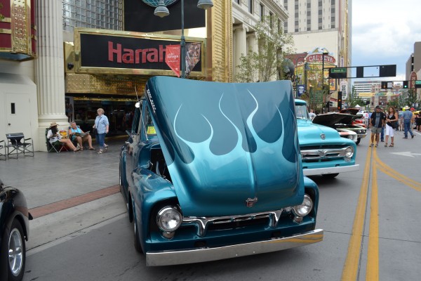 flamed paint job on the hood of a customized ford truck hot rod
