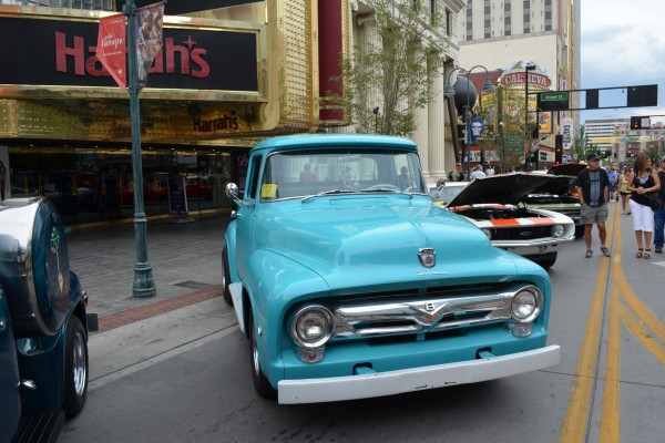 vintage blue ford truck parked on main street at hot august nights 2014