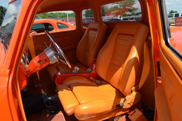 interior of an orange 1948 Chevy Pickup Custom Hot rod