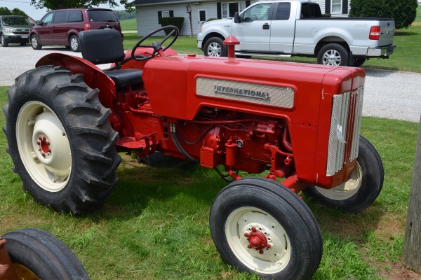vintage international tractor at an antique farm equipment show