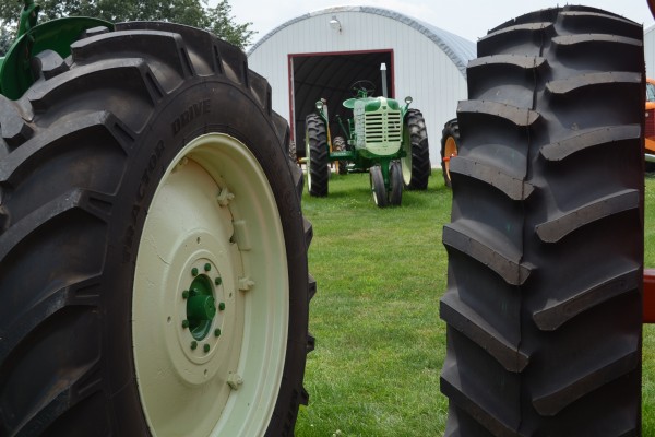 large tires at an antique farm equipment show