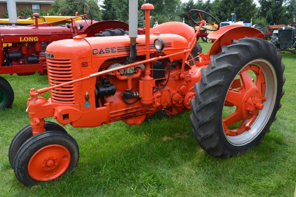 vintage case sc tractor at an antique farm equipment show