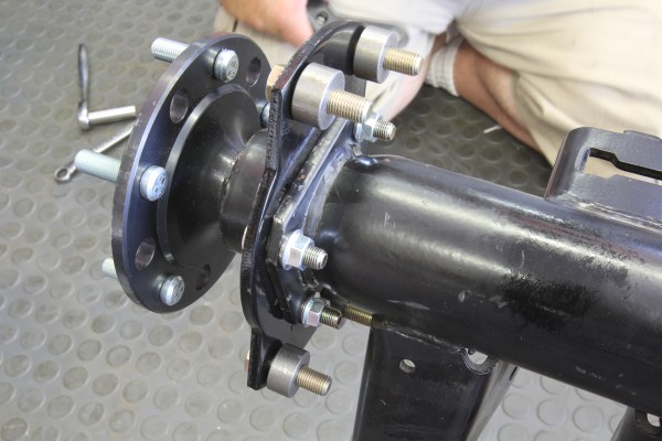 backside of axle flange for a brake caliper install