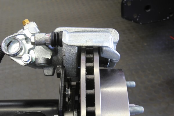 checking brake pad clearance on a caliper