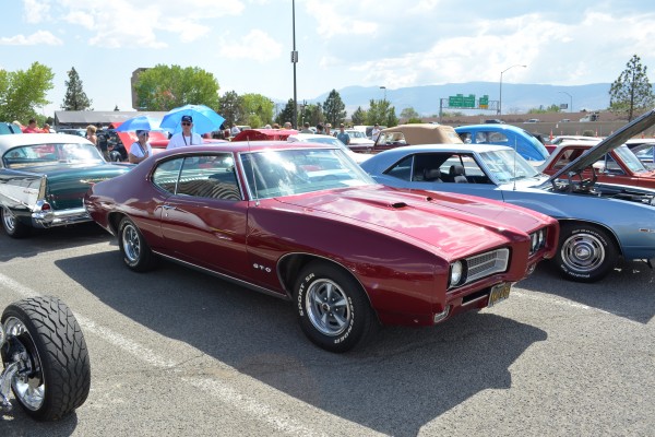red second generation pontiac gto fastback coupe
