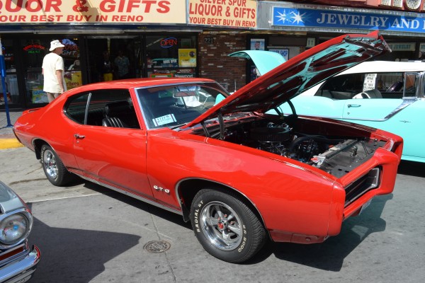 second gen red pontiac gto fastback coupe