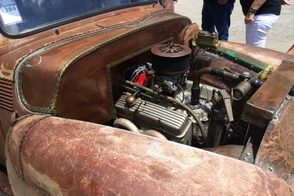 engine bay of a custom show truck with a chevy v8