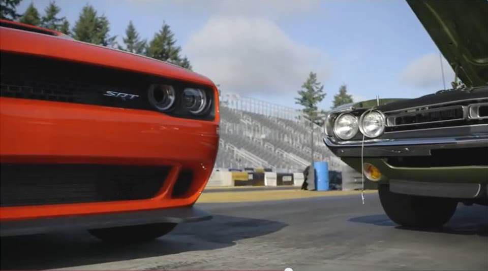 a new and vintage dodge challenger on a dragstrip