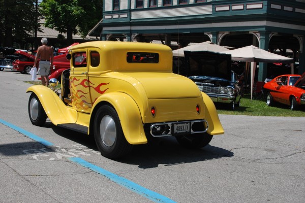 yellow ford five window deuce coupe hot rod