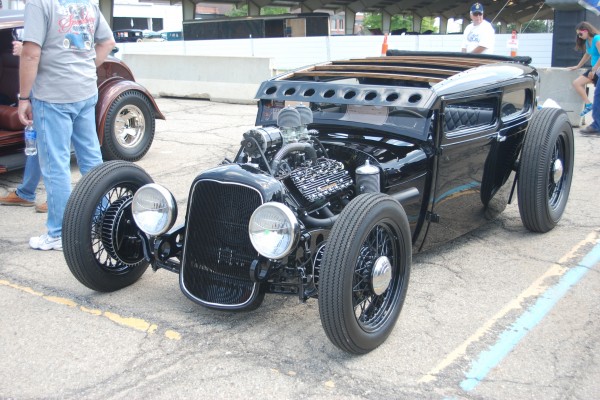 lowered ford hotrod with flathead v8