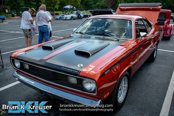 plymouth duster with dual hood scoops at summit racing car show