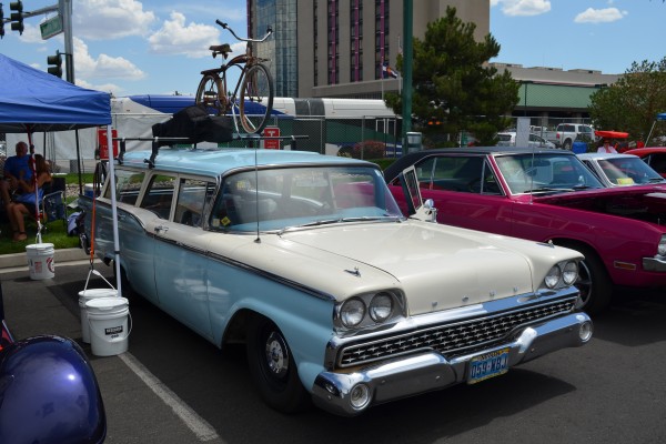 1959 ford station wagon with bike on its luggage rack