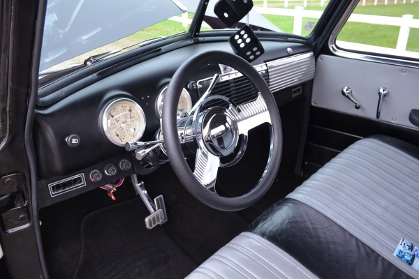 dash, gauges and steering wheel in a custom 1949 chevy 3100 truck