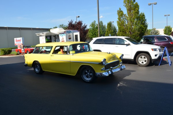 yellow 1955 chevy nomad station wagon