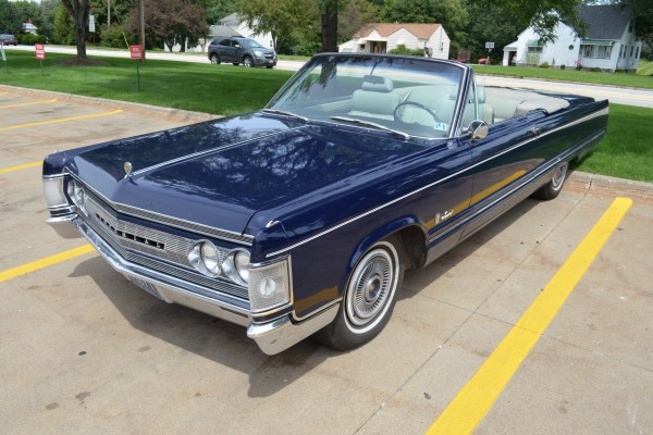 blue 1967 Chrysler Imperial convertible with white interior