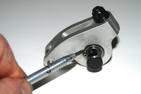 man pointing to a shaft mount rocker arm