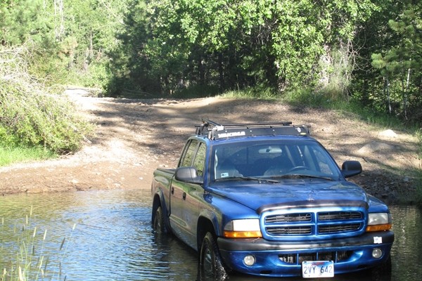 dodge dakota truck fording a small stream