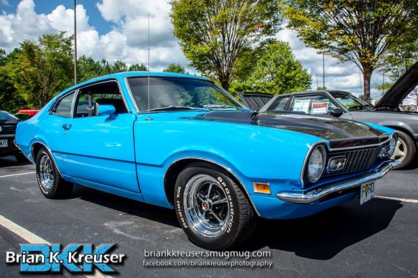 blue ford fastback maverick from the 1970s