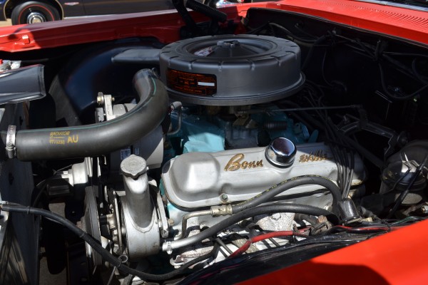 pontiac v8 engine under the hood of a 1964 Bonneville
