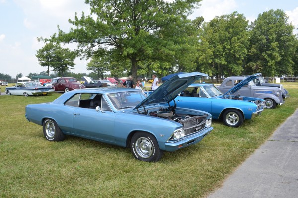 a pair of chevelle muscle cars at summit motorsports park