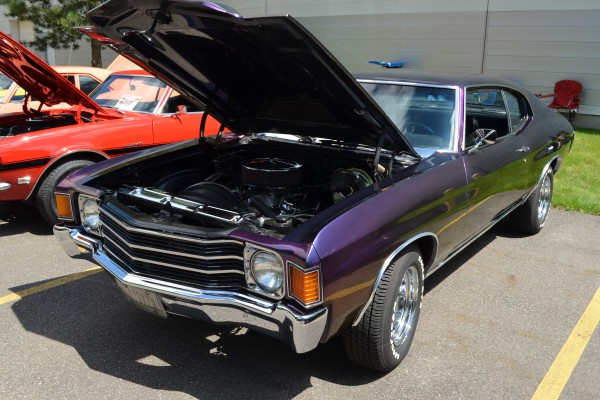 purple customized Chevy Chevelle at summit racing car show