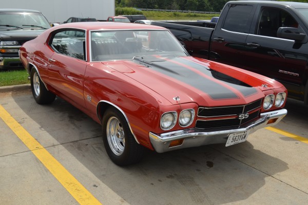 red second gen Chevy Chevelle SS with cowl induction hood