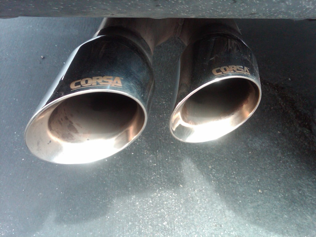 close up of corsa exhaust tips on a car