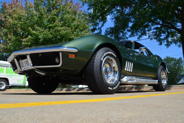 green 1969 chevy corvette stingray with side pipes